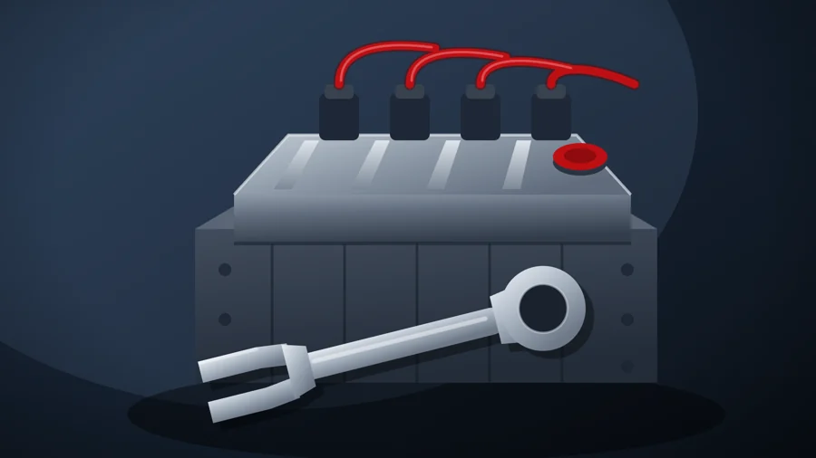 Engine with spark plug wires and a wrench